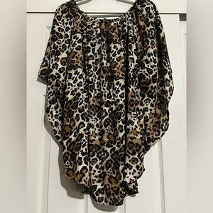 Cheeta print shirt. 100% Polyester